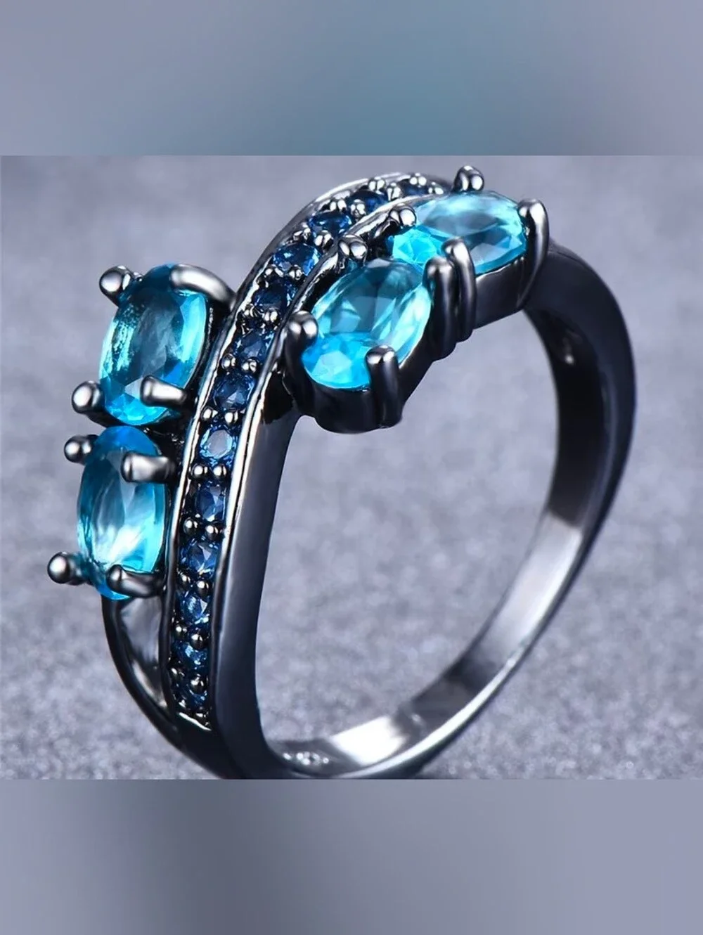 $8 Each Or Bundle 5/$20 Blue Crystal Twist Black Ring